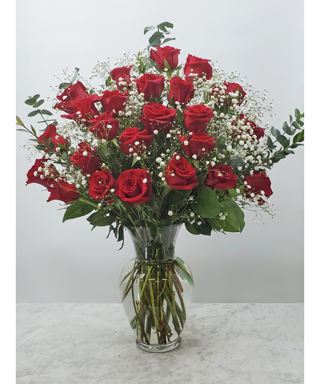 One dozen red roses arranged as you like.